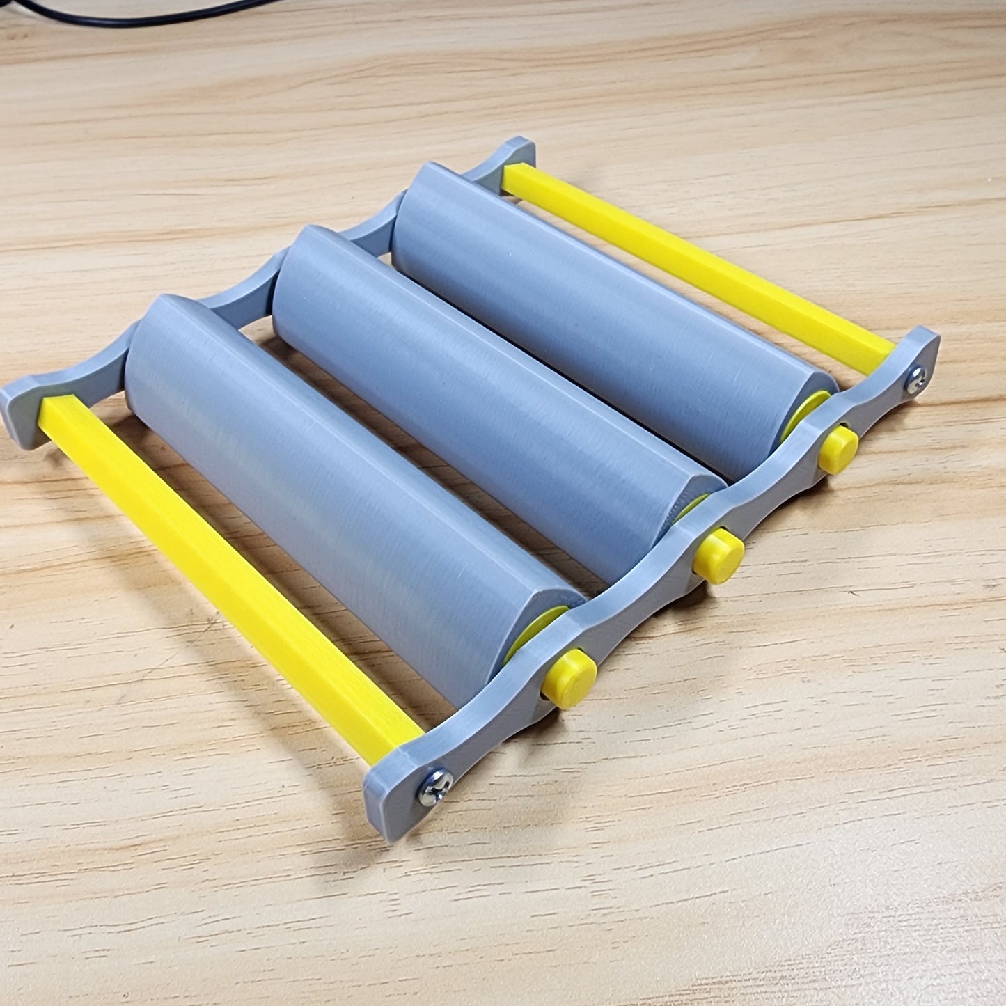 Rodillos de Reuleaux con Eje – Movimiento con Anchura Constante